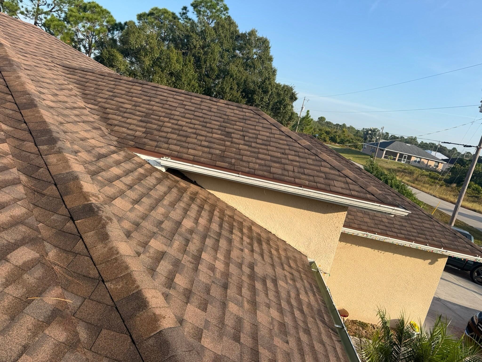 Dimensional shingle roof valley and dormer detail